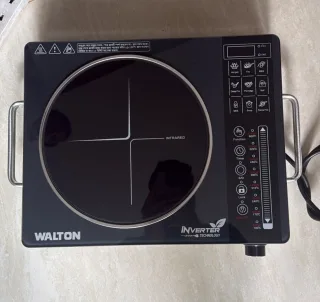 Walton Heat Star infrared cooker real unit — top view with 9 presets and power scale